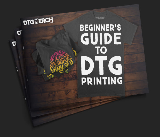 Three books on top of each other. The cover reads: DTG Merch - The Beginners Guide to DTG Printing.